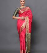 Pink woven banarasi silk saree with blouse