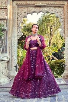 Wine Sequins Embroidered Soft Net Wedding Wear Lehenga Choli