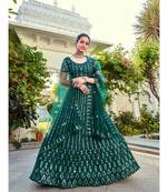 Green Sequins Embroidered Soft Net Wedding Wear Lehenga Choli