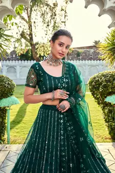 Green Sequins Embroidered Soft Net Wedding Wear Lehenga Choli