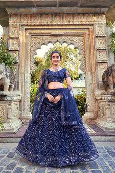 Blue Sequins Embroidered Soft Net Wedding Wear Lehenga Choli