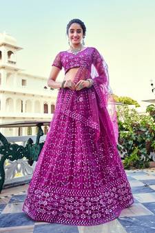 Pink Sequins Embroidered Soft Net Wedding Wear Lehenga Choli