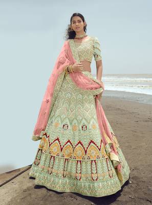 Enchanting Pista green dori, zarkan and thread embroidered georgette semi stitched wedding lehenga 1