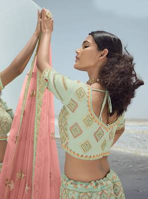 Enchanting Pista green dori, zarkan and thread embroidered georgette semi stitched wedding lehenga 3