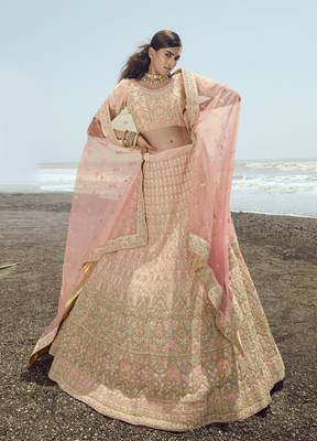 Dazzling Peach zari, zarkan and thread embroidered georgette semi stitched wedding lehenga 1