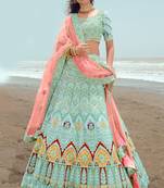 smashing Turquoise dori, zarkan and thread embroidered georgette semi stitched bridal lehenga