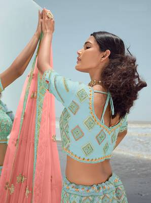 smashing Turquoise dori, zarkan and thread embroidered georgette semi stitched bridal lehenga 3