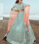 Ravishing Turquoise zari, zarkan and thread embroidered georgette semi stitched designer lehenga