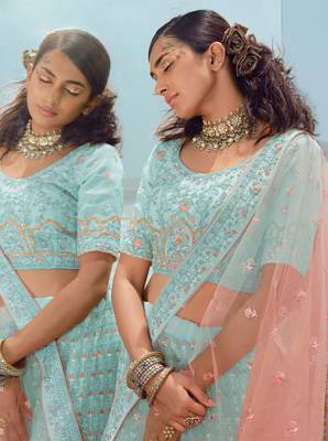 Ravishing Turquoise zari, zarkan and thread embroidered georgette semi stitched designer lehenga 2