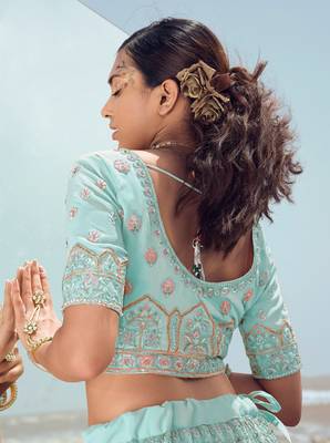 Ravishing Turquoise zari, zarkan and thread embroidered georgette semi stitched designer lehenga 3