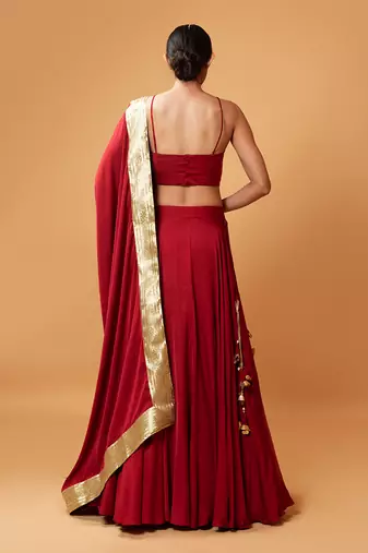 Deep Red Coloured Sleeveless Lehenga.