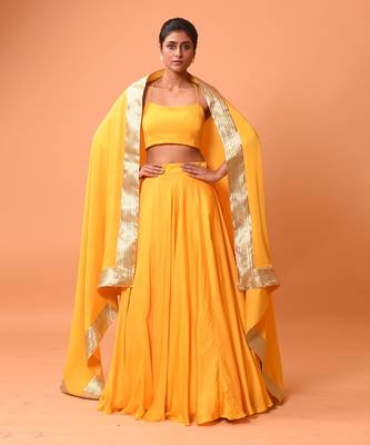 Bright Yellow Coloured Sleeveless Lehenga. 1