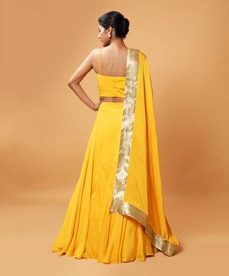 Bright Yellow Coloured Sleeveless Lehenga. 2
