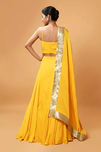 Bright Yellow Coloured Sleeveless Lehenga.