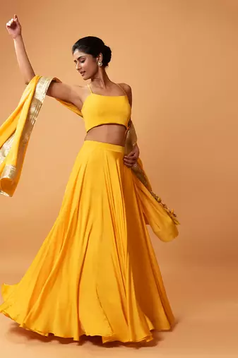 Bright Yellow Coloured Sleeveless Lehenga.