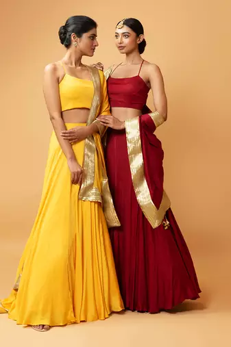 Bright Yellow Coloured Sleeveless Lehenga.