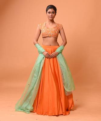 Bright Orange Lehenga With Intricate Handwork  1