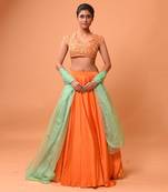 Bright Orange Lehenga With Intricate Handwork 
