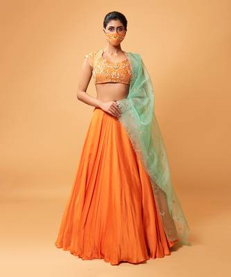Bright Orange Lehenga With Intricate Handwork  3