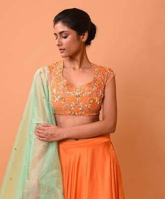 Bright Orange Lehenga With Intricate Handwork  5