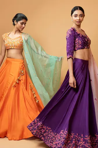 Violet Lehenga With Intricate Handwork Paired  With A  Pink Dupatta
