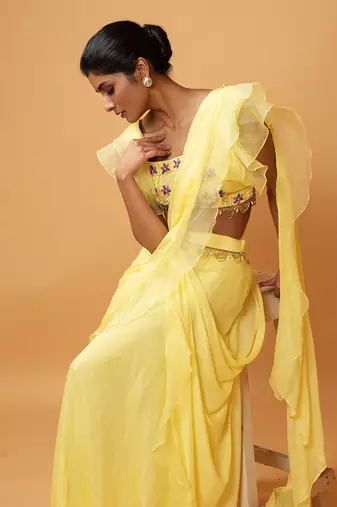 Yellow Ruffle Saree With Lace.