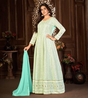 SPECTACULAR TURQUOISE FANCY SEQUINS EMBROIDERED GEORGETTE PARTY WEAR GOWN SEMI STITCHED 4
