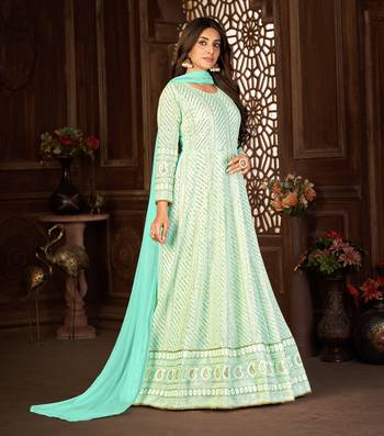 SPECTACULAR TURQUOISE FANCY SEQUINS EMBROIDERED GEORGETTE PARTY WEAR GOWN SEMI STITCHED 5