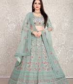 Mesmerizing Greyish blue dori & thread embroidered with diamond work net semi stitched lehenga choli with dupatta