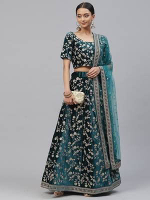Turquoise embroidered velvet semi stitched lehenga 1