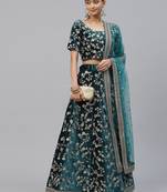 Turquoise embroidered velvet semi stitched lehenga