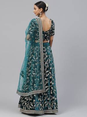 Turquoise embroidered velvet semi stitched lehenga 2