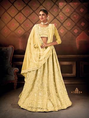 Gold embroidered net semi stitched lehenga 1