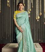 Turquoise woven silk saree with blouse