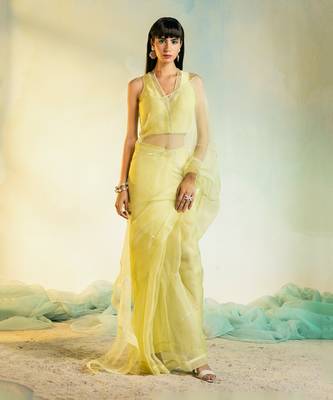 Pastel Yellow Organza Saree with Sleeveless Blouse 1