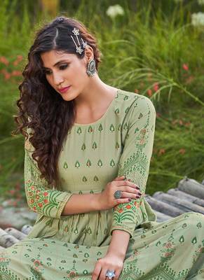 Smart And Elegant Pista Colour Long Kurti With Ethnic Print 2
