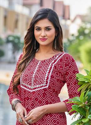 Ethnic and Sober Kurti in Maroon Colour with Print and Embroidery Work 2