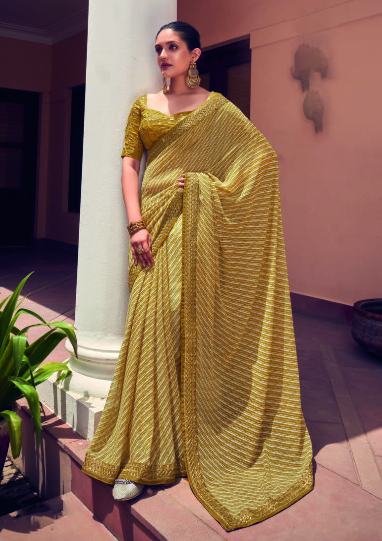 Ivory embroidered georgette saree with blouse