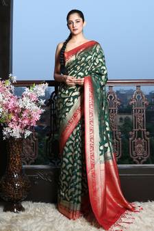 Dark green woven silk blend saree with blouse