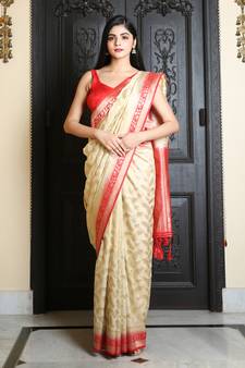 White woven silk blend saree with blouse