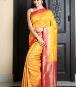 Yellow woven silk blend saree with blouse