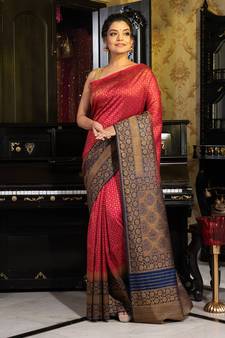 Pink woven silk blend saree with blouse