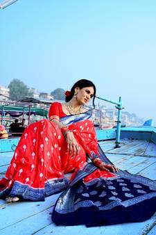 Red woven georgette saree with blouse
