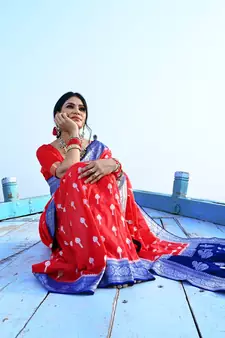 Red woven georgette saree with blouse