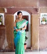 Green woven Faux kanchipuram silk saree with blouse