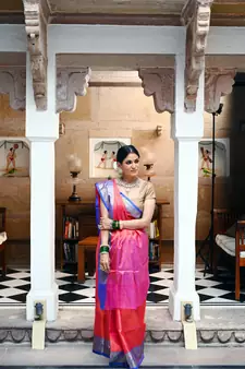 Orange woven Faux kanchipuram silk saree with blouse