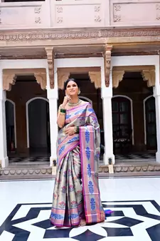 Pink woven kanchipuram silk blend saree with blouse