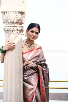 Beige woven Faux kanchipuram silk saree with blouse