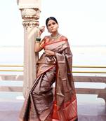 Beige woven Faux kanchipuram silk saree with blouse