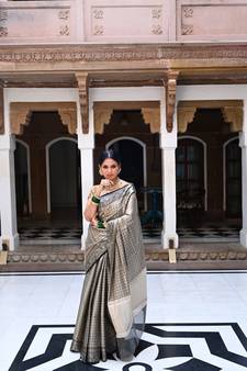 Black woven Faux kanchipuram silk saree with blouse